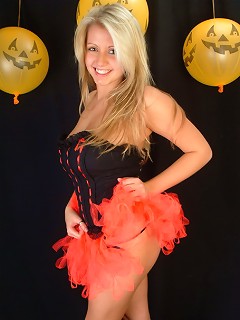 Emilys big boobs bulges out of her Halloween corset